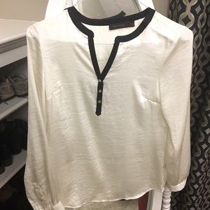 White silky blouse, black trim, gold buttons
